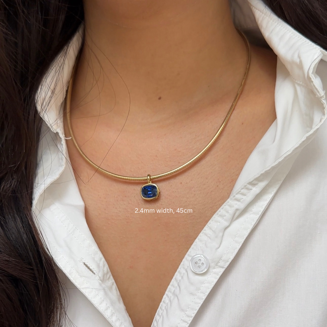 Omega Necklace & Blue Sapphire Pendant in 18K Gold